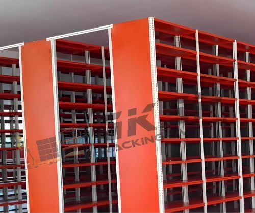 Slotted angle racks, white and red in color with bracing for additional support, racks are empty and are ready for the use.